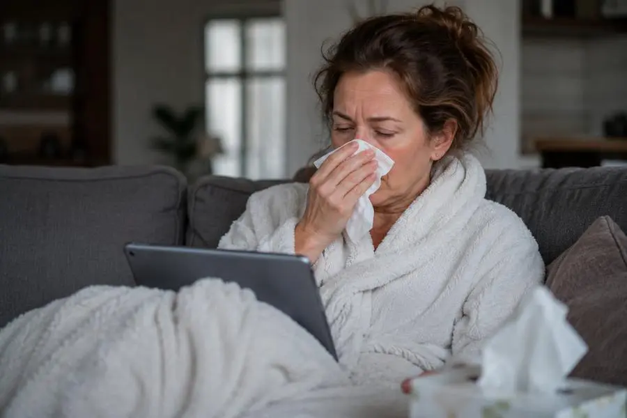 Woman at home having a primary care telehealth visit